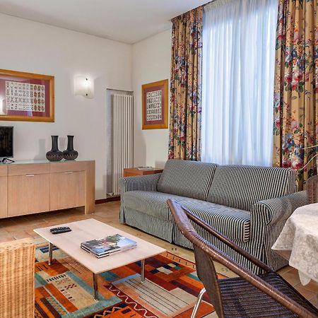 Palazzo Brando - Living Apartments تريفيزو الغرفة الصورة